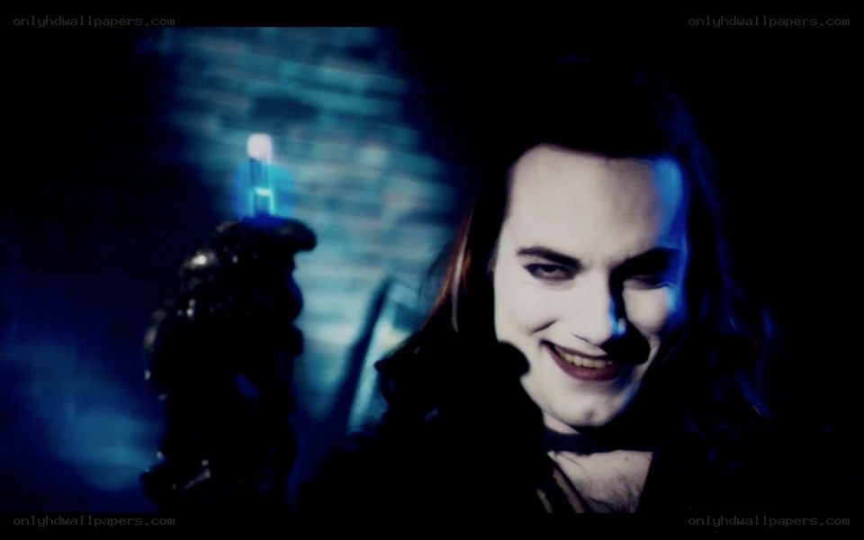 man holding glowing vial