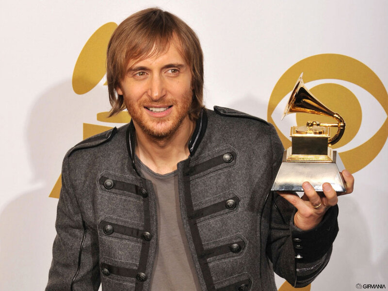 Man Holding Grammy Award