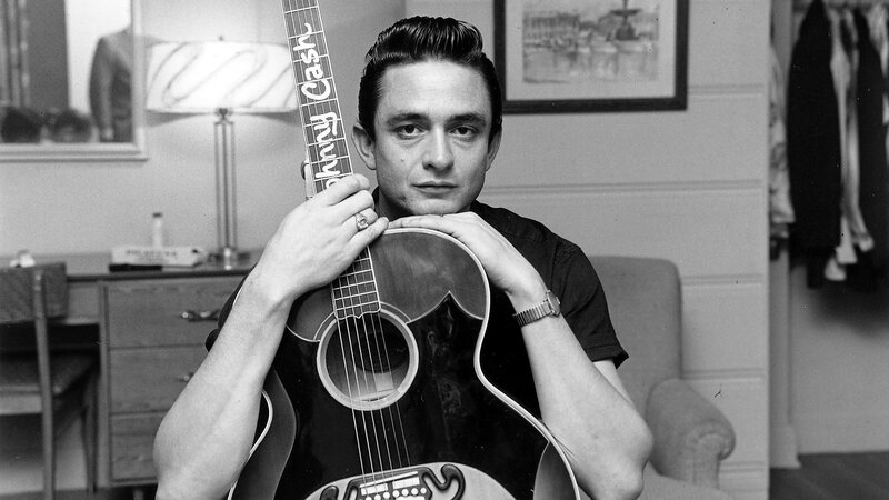 Man Holding Guitar — Black, Serious, Photograph, Lamp