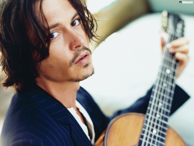 Man Holding Guitar — Blue