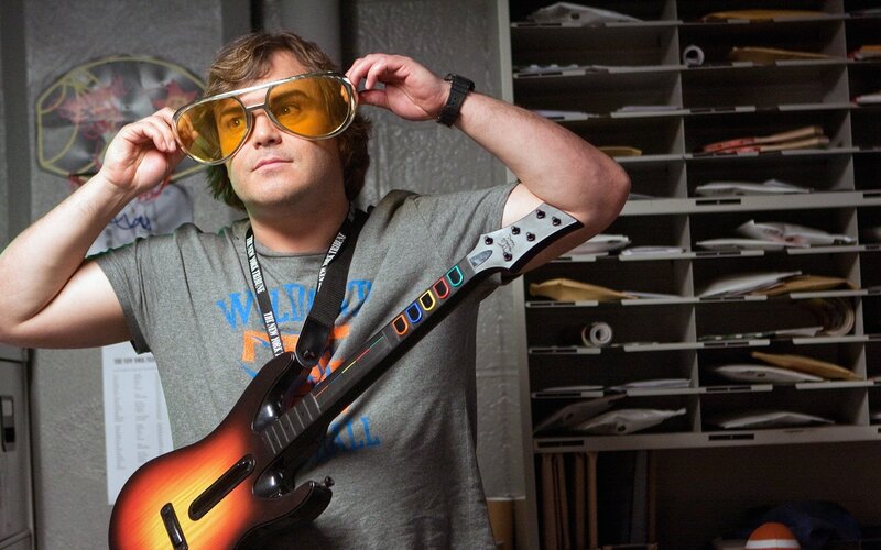 Man Holding Guitar Controller — Gray