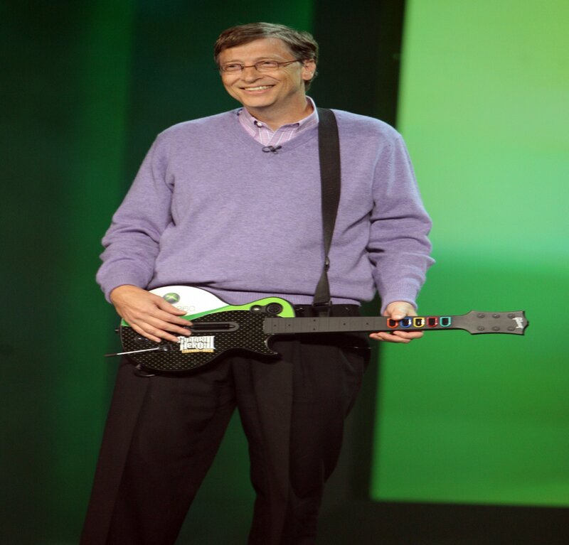 Man Holding Guitar Controller