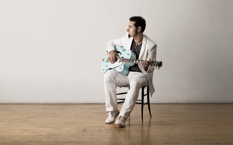 Man Holding Guitar — White, Calm