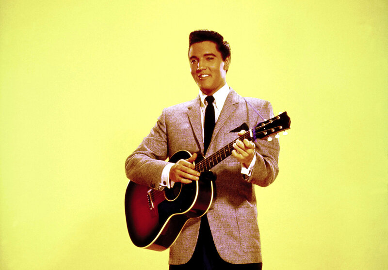 Man Holding Guitar — Yellow