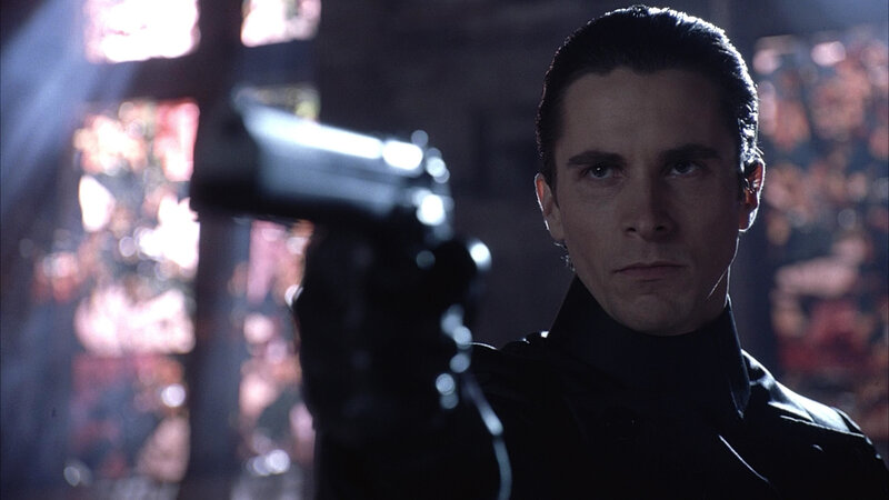 Man Holding Gun — Black, Dramatic, Photograph, Dark Clothing