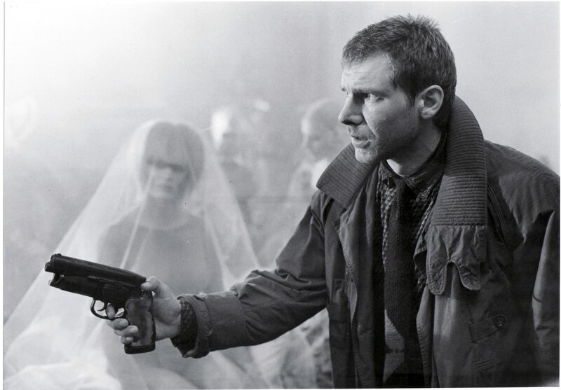 man holding gun in fog