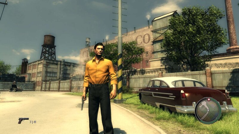 Man holding gun in industrial area