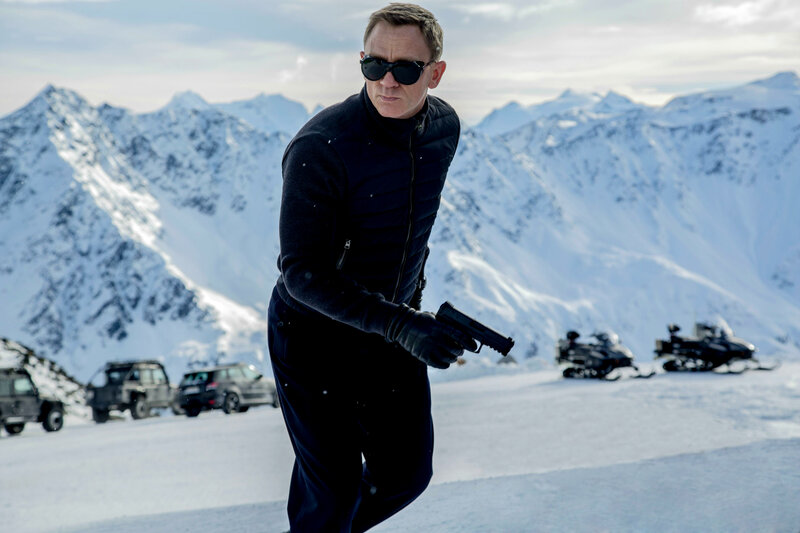 Man Holding Gun in Snow