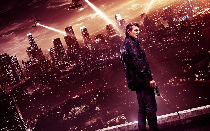 Man Holding Gun on Rooftop — Red