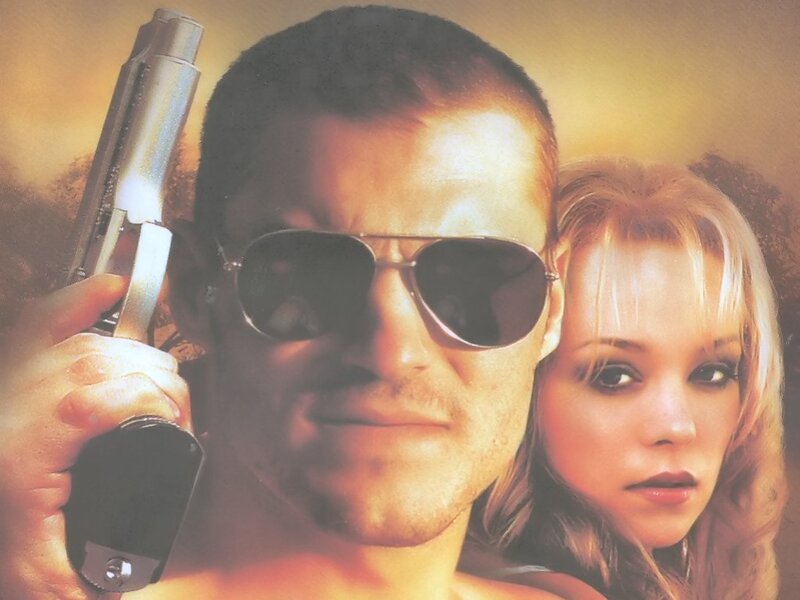 Man Holding Gun — Yellow