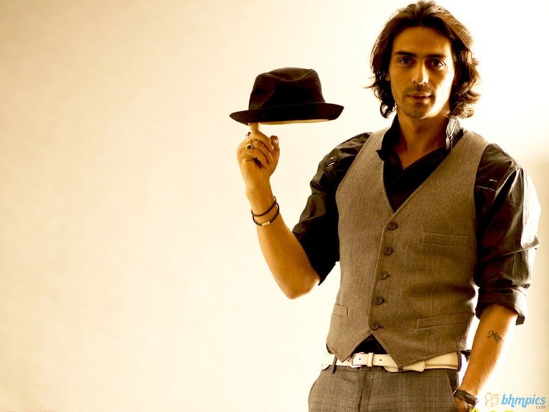 Man Holding Hat