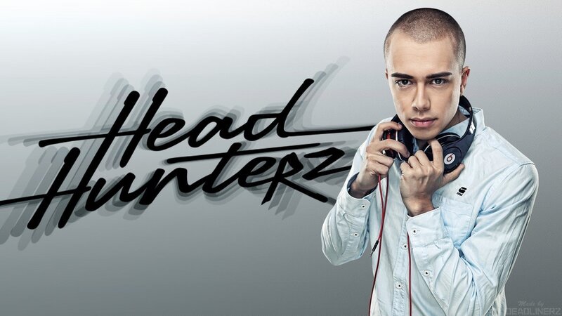 Man Holding Headphones — Gray