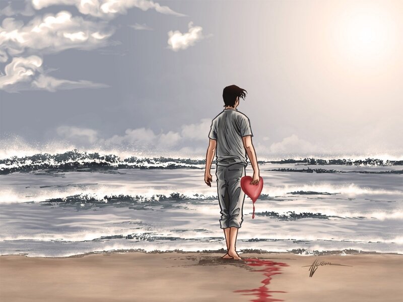 Man Holding Heart on Beach