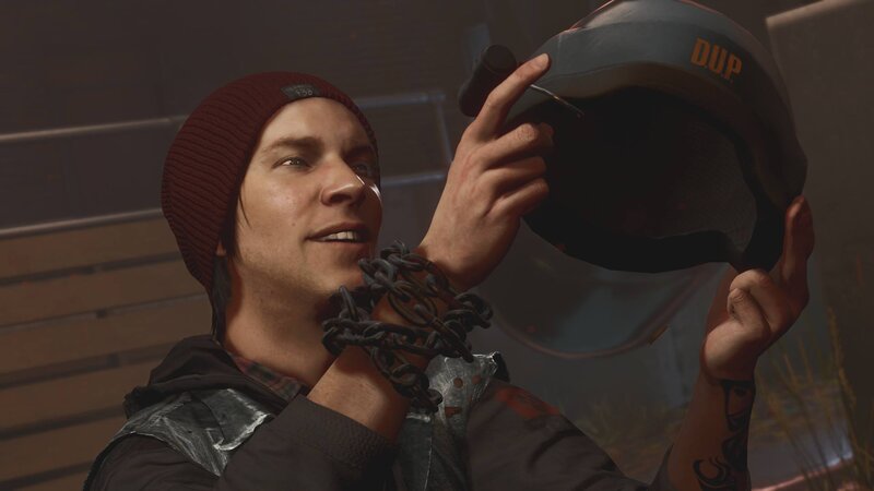 Man Holding Helmet — Gray