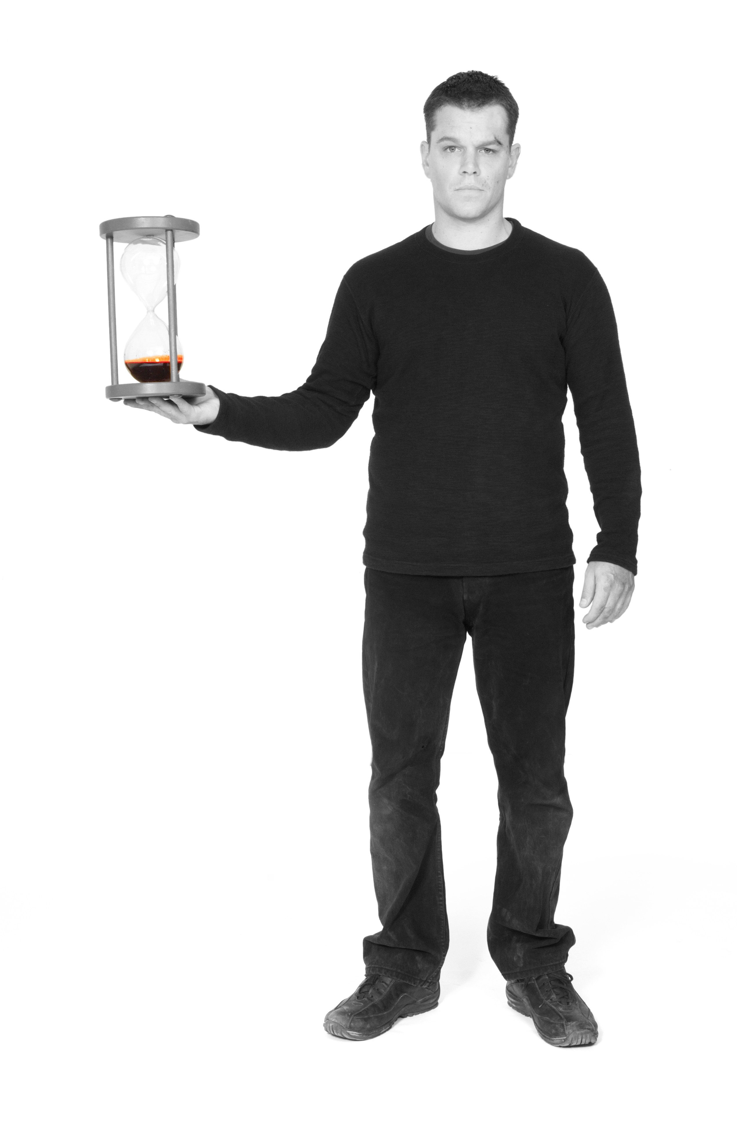 man holding hourglass