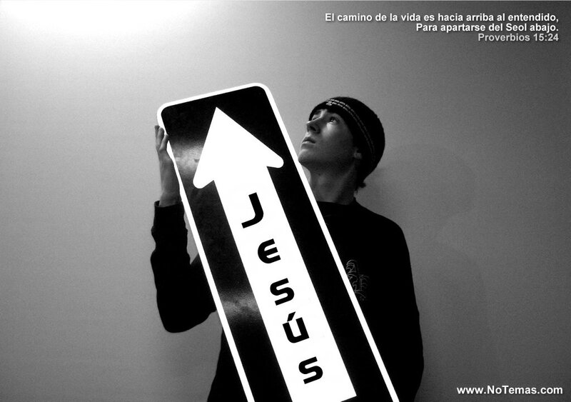Man holding Jesus sign