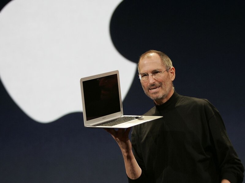 Man Holding Laptop