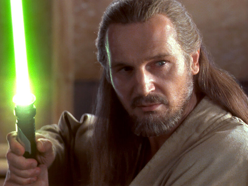 Man Holding Lightsaber — Green