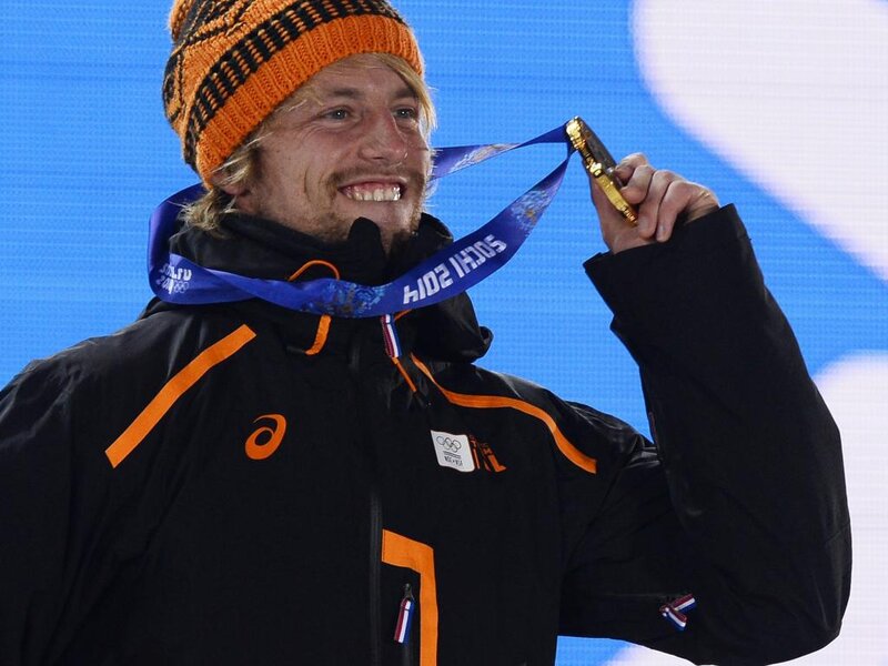 Man Holding Medal — Black, Celebratory