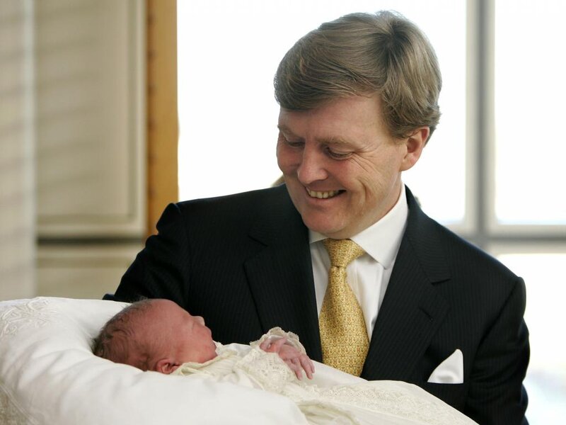 Man Holding Newborn Baby — Black