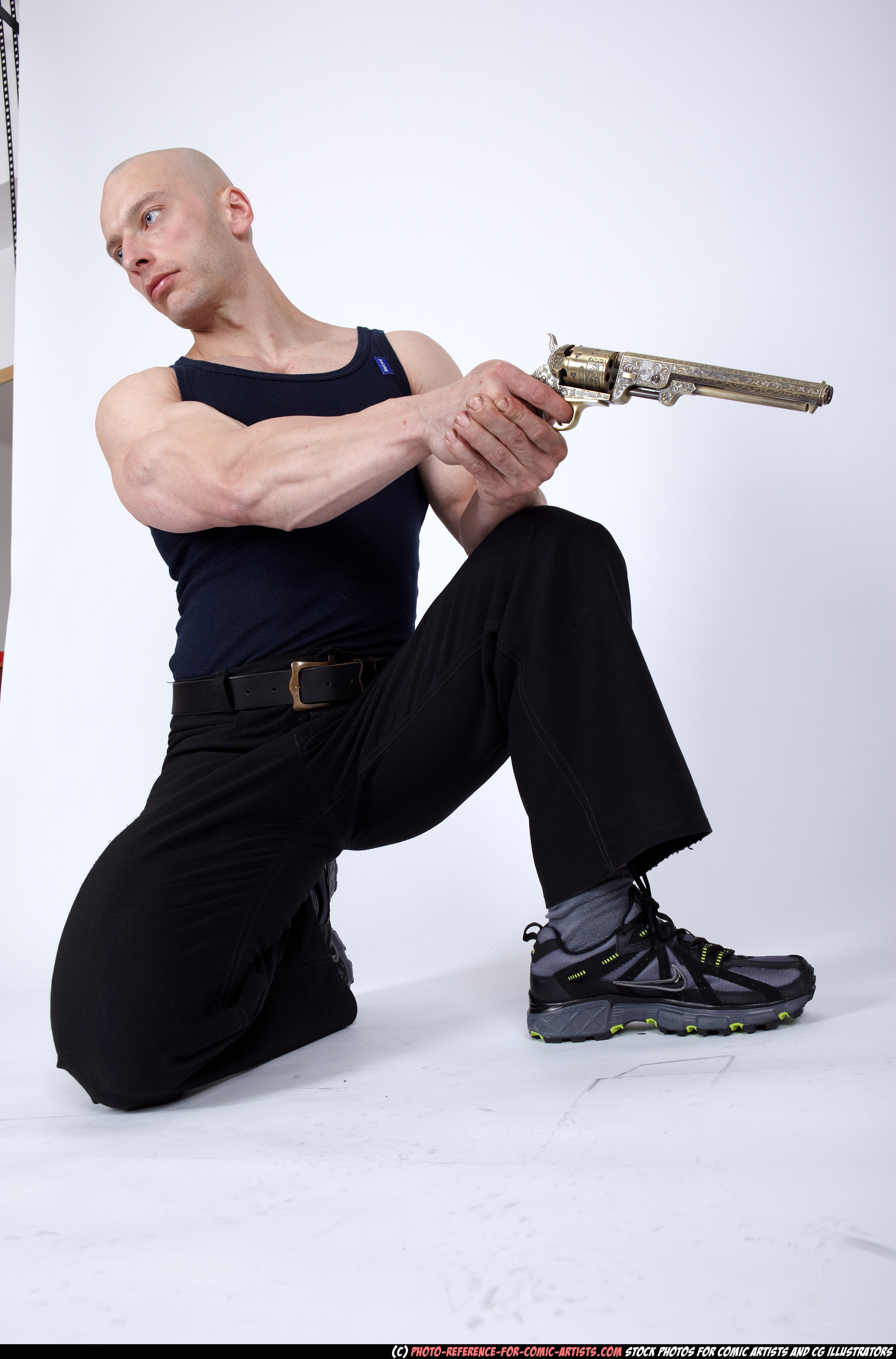Man holding ornate revolver