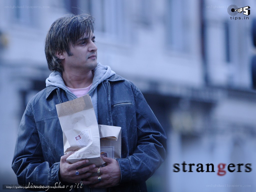 man holding paper bag