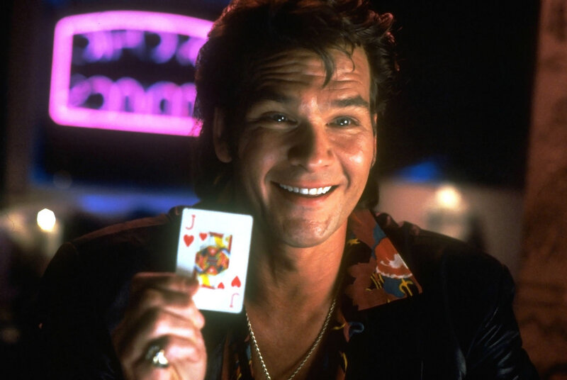 Man Holding Playing Card — Black, Confident, Night