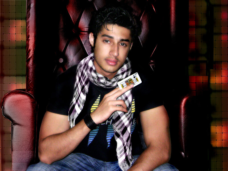 Man Holding Playing Card — Black, Confident