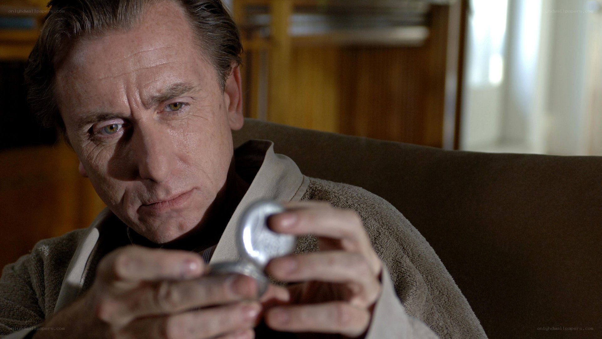 man holding pocket watch