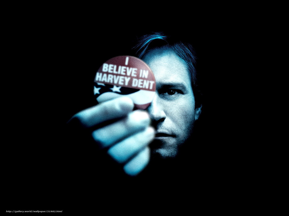 Man holding political button