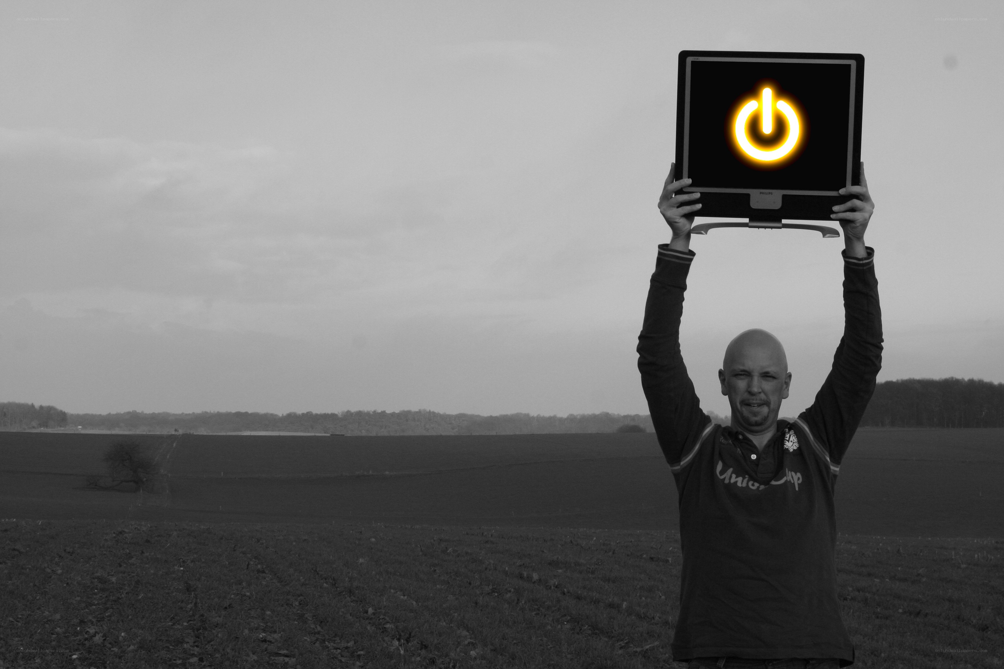 Man holding power symbol