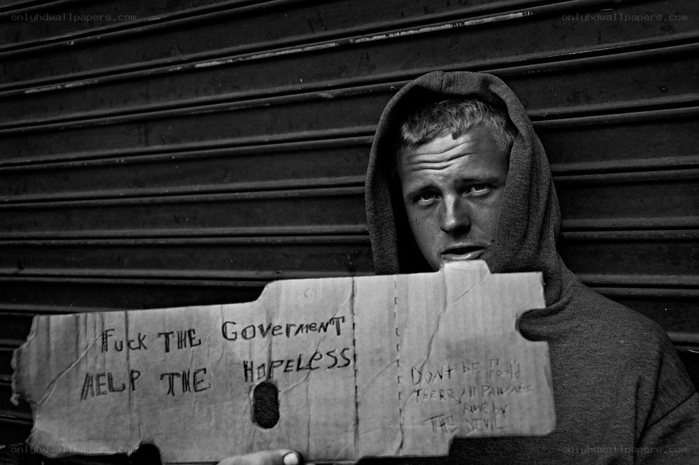 Man holding protest sign