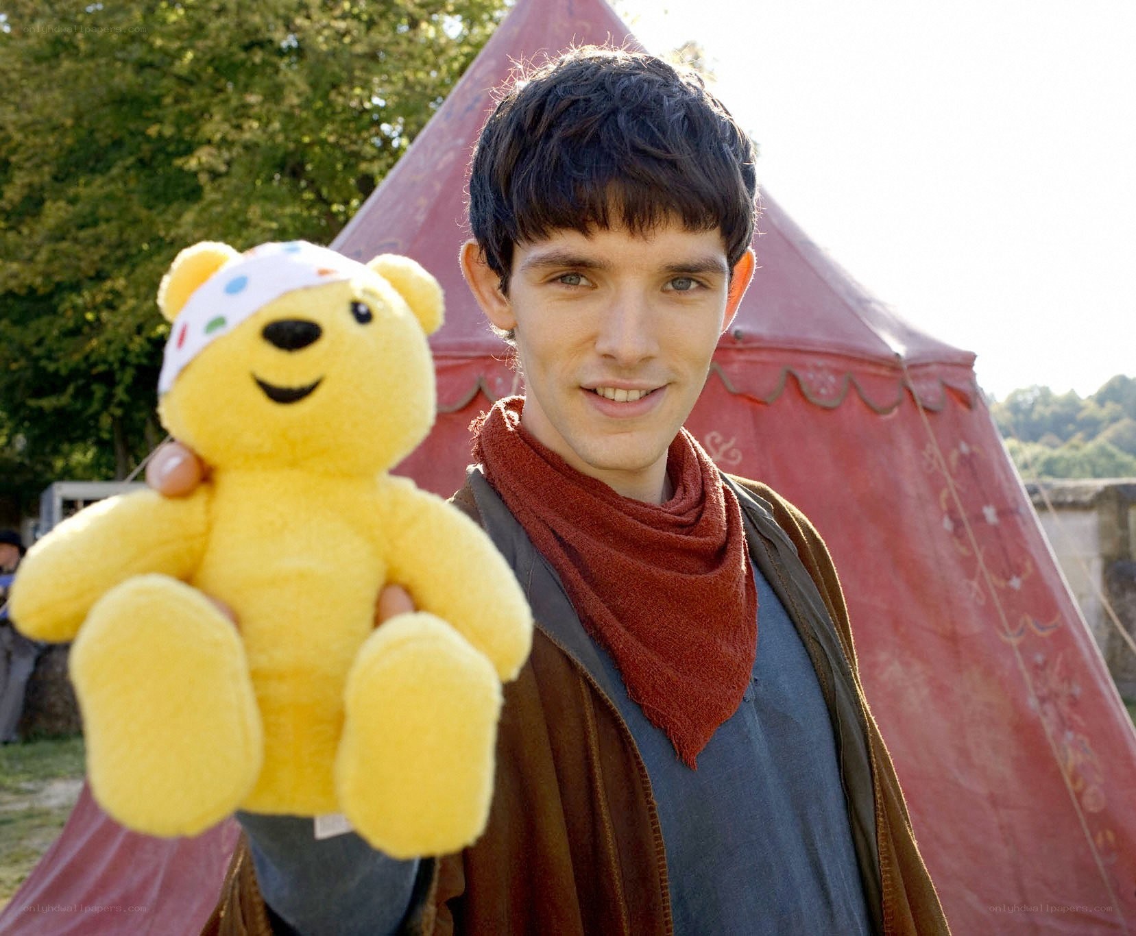 Man holding Pudsey bear