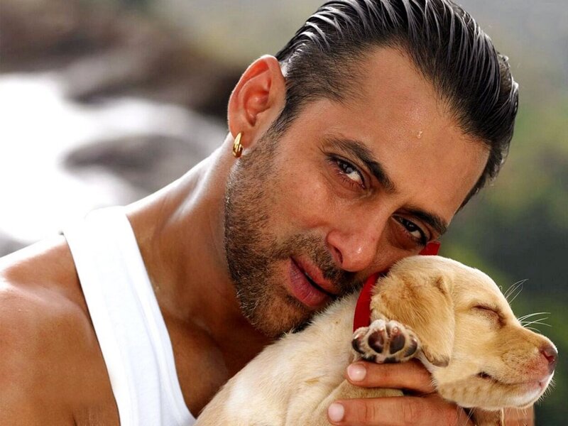 Man Holding Puppy