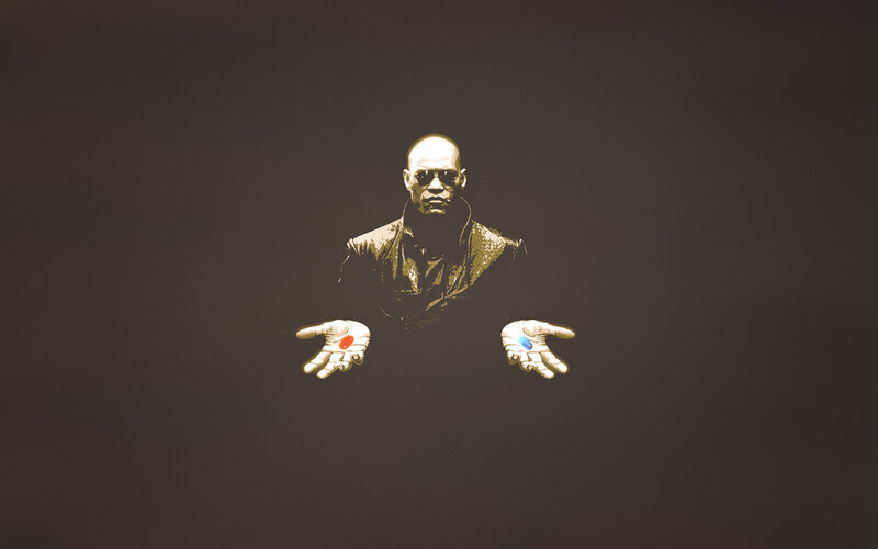 man holding red and blue pills