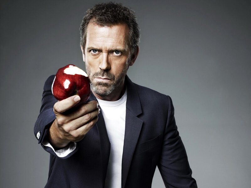 man holding red apple