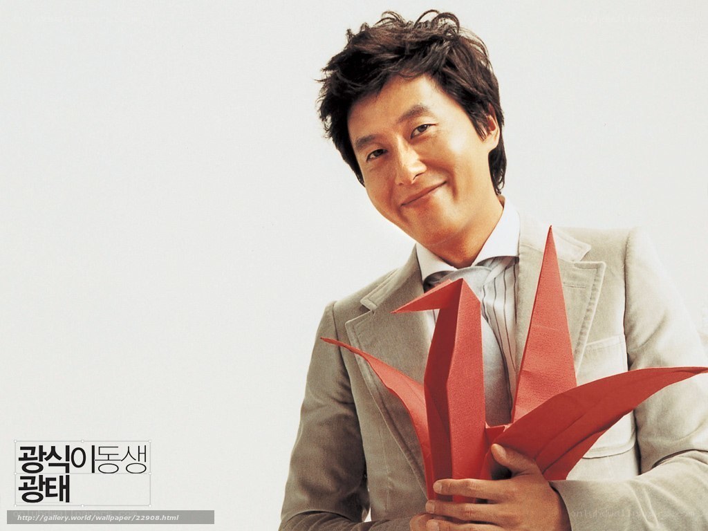 Man holding red origami crane