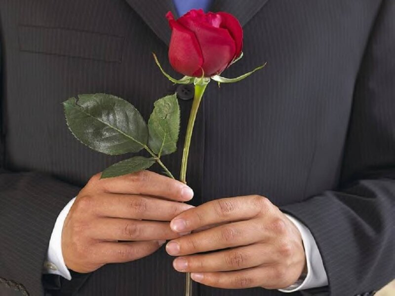 Man Holding Red Rose — Formal, Photograph