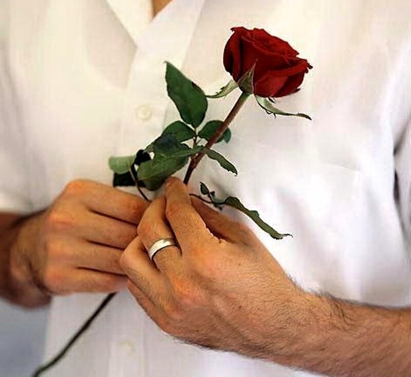 Man Holding Red Rose — Romantic