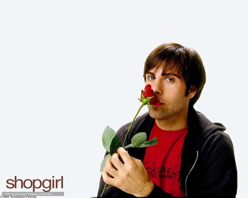 man holding red rose