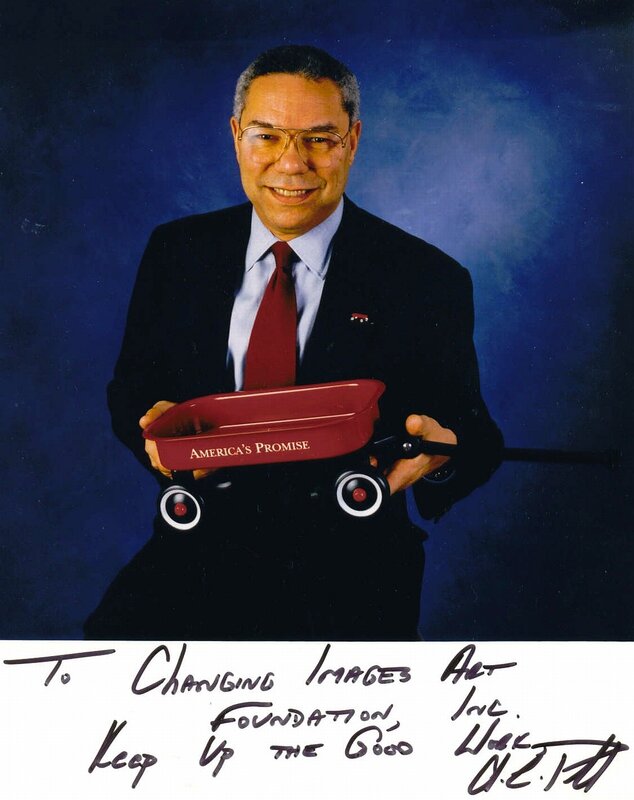 Man holding red wagon