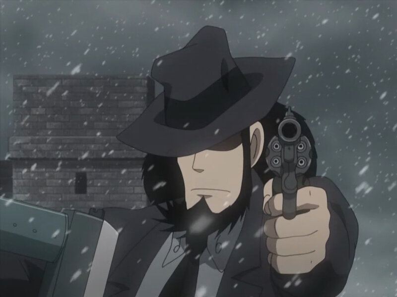 man holding revolver in snow