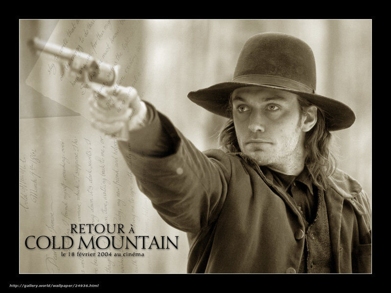 man holding revolver