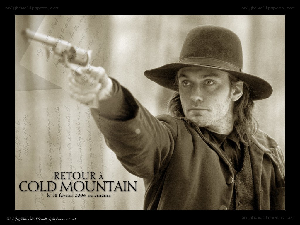 man holding revolver