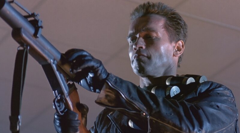 Man Holding Rifle — Black, Dramatic, Photograph, Leather Jacket