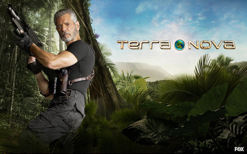 Man Holding Rifle in Jungle