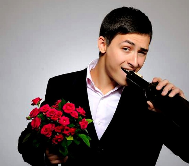Man Holding Roses and Wine
