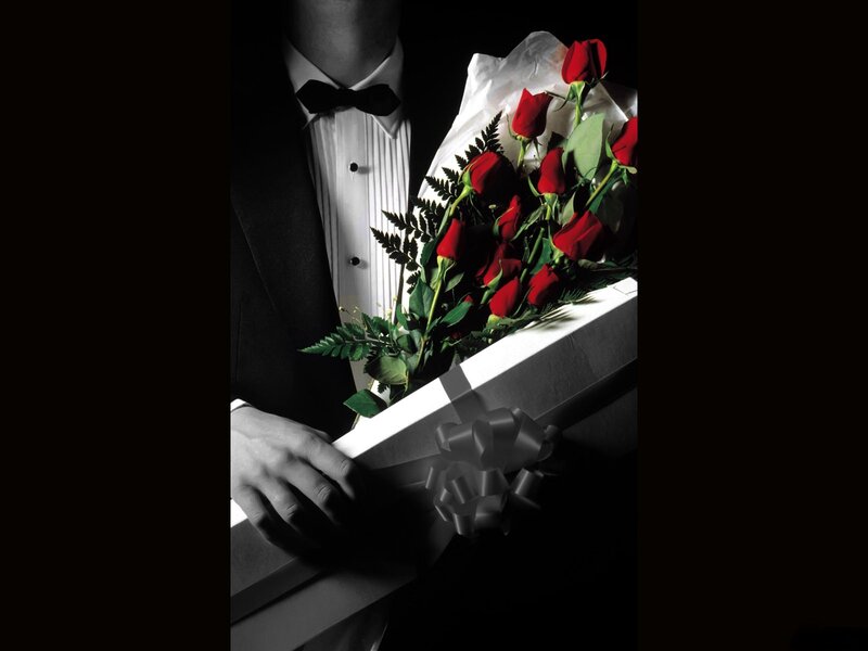 Man Holding Roses — Black, Dramatic