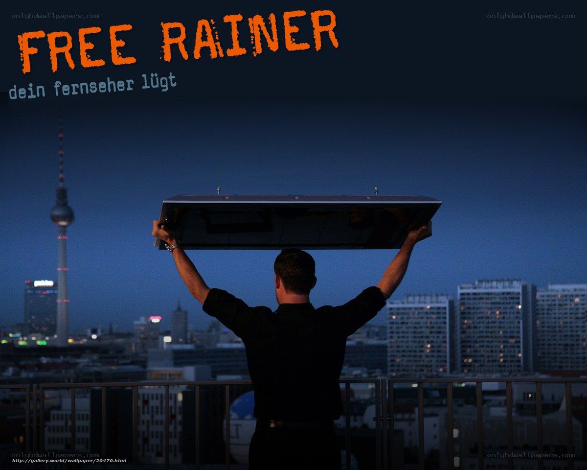 Man holding screen over city