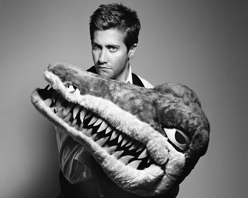 man holding shark puppet